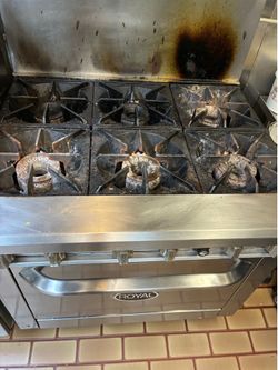 Commercial kitchen stove with oven used