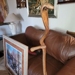 Is solid oak one piece hand carved half staff Cobra cane