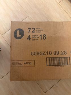 Size large adult diapers have 2 & 1 box of green pads