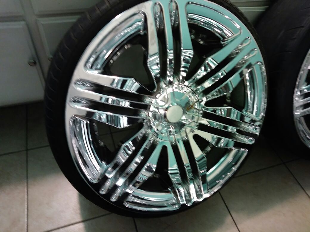 27 inch lexani big Johnson chrome wheels.TRADE..TRADE