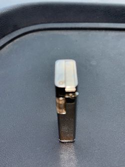 Vintage silver roll lighter