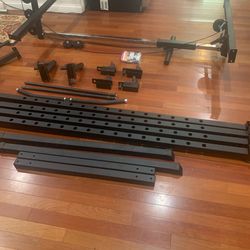 Power cage with let pull machine and J hooks and dip bars and let pull bar