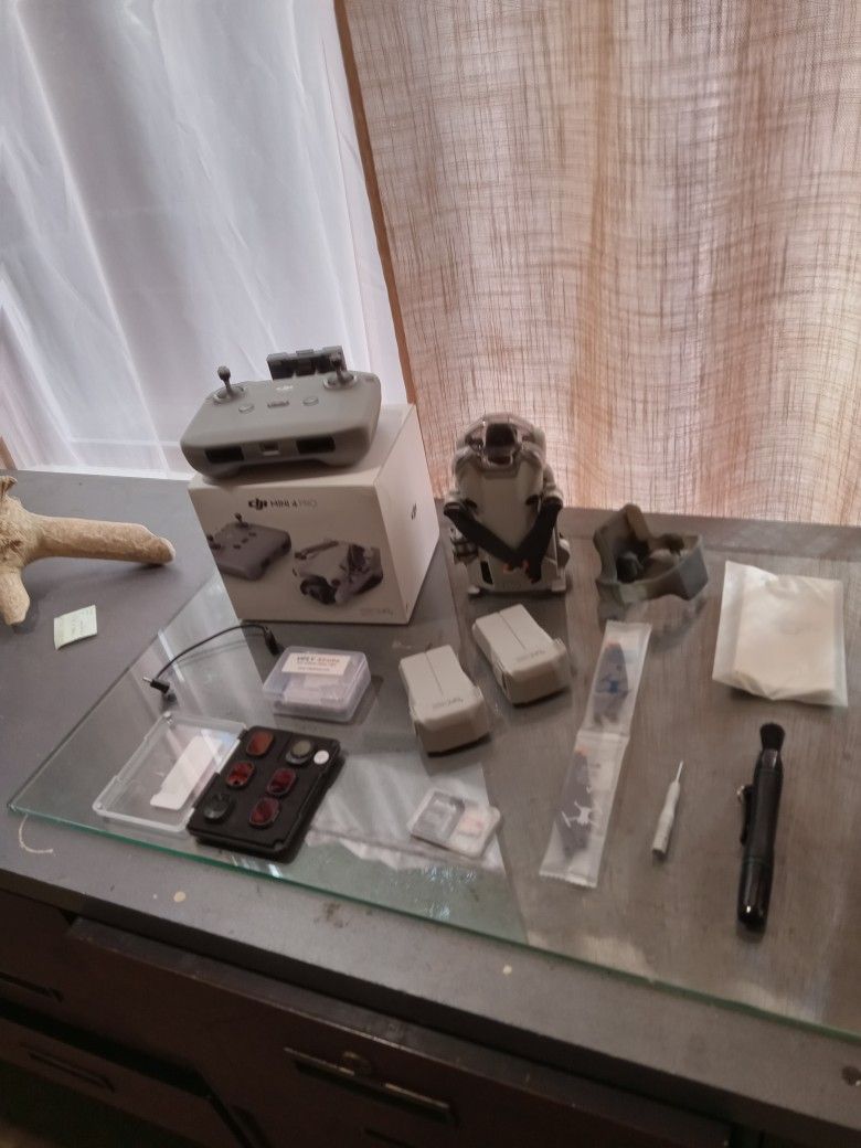 DJI Mini 4 Pro Drone + Extras