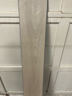 Light Gray Wood-Look Vinyl Plank Flooring