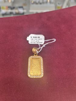 10k Gold solid gold pendant with diamond around it 10.8 grams layaway available 10% Dwon if you interested please make sure you ask for Maribel thank 