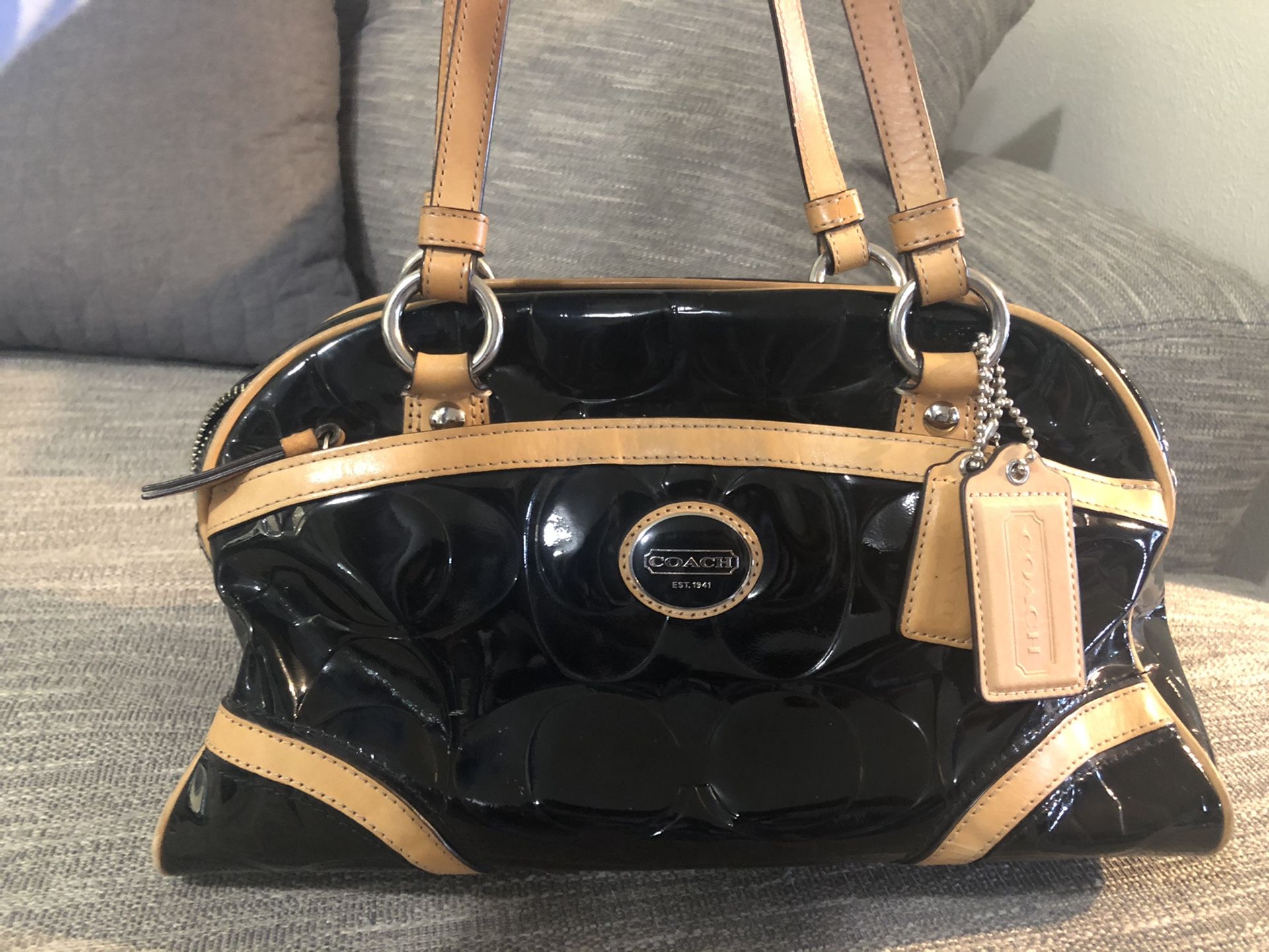 Gently used Coach Purse.... This is a real authentic Coach Purse I don’t use anymore. In great condition just doesn’t hold all I want.