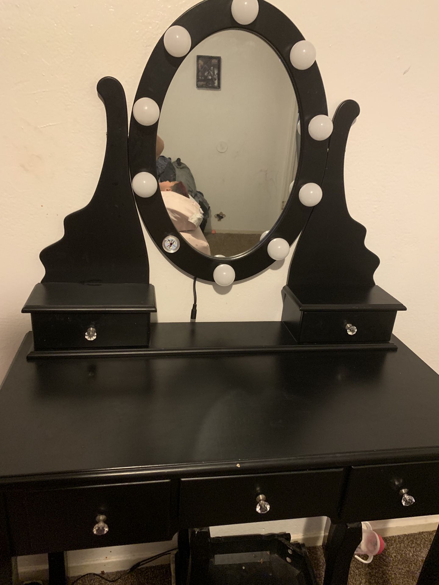 Vanity with lighted mirror