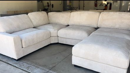 Beautiful Ivory Sectional with Ottoman