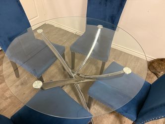 Glass dining table with chairs
