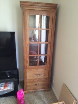 4 piece pier cabinets. 2 cabinets with 4 shelves and 2 drawers. Overhead lighted bridge with shelf below for electronics