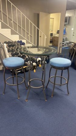 Indoor / Outdoor Bistro Table and swivel chairs