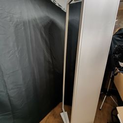 Cabinet That Rotates Mirror And Bookshelf