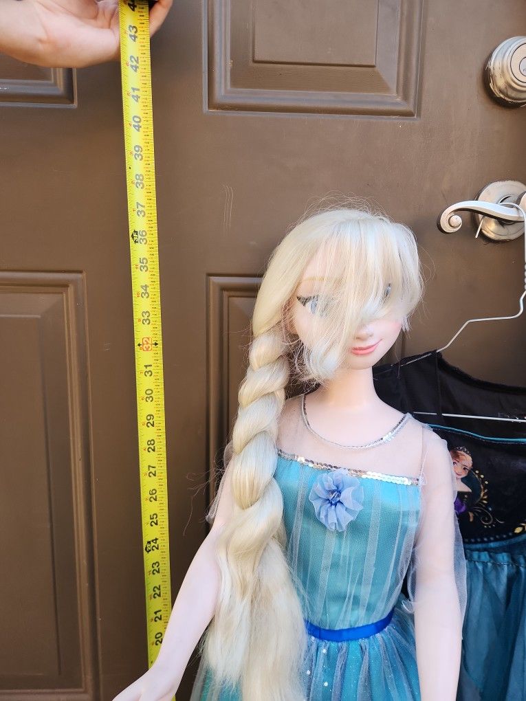Frozen kids size doll.