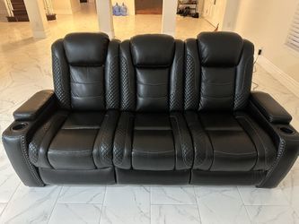 Ashely furniture power reclining black leather sofa
