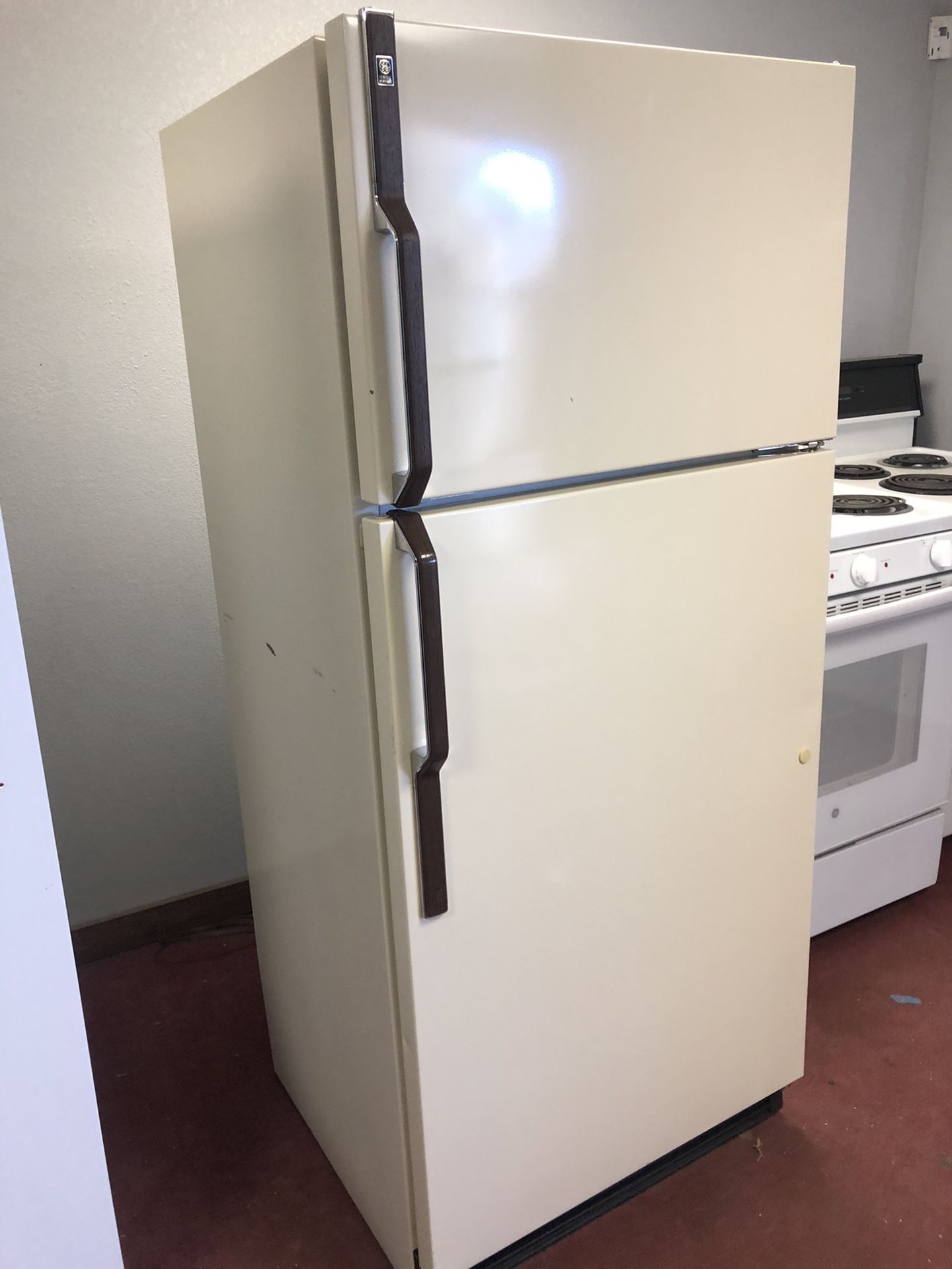 Refrigerator G E almond color for $135