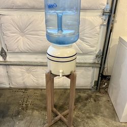 ceramic water dispenser, stand & 5 gallon plastic jug