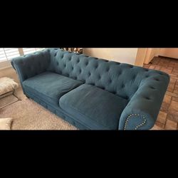 2 blue couches 