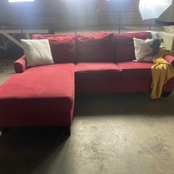 Roman red ashley furniture sectional sleeper!$300 investment