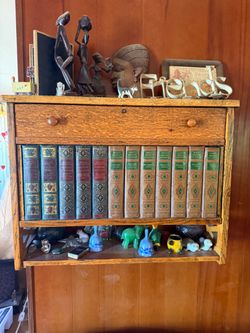 BOOKCASE LOOKING SHELF 24 3/4"w x 8"d x 19"tall; cross streets are Arapaho & Waterview