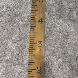 Wooden ruler sign