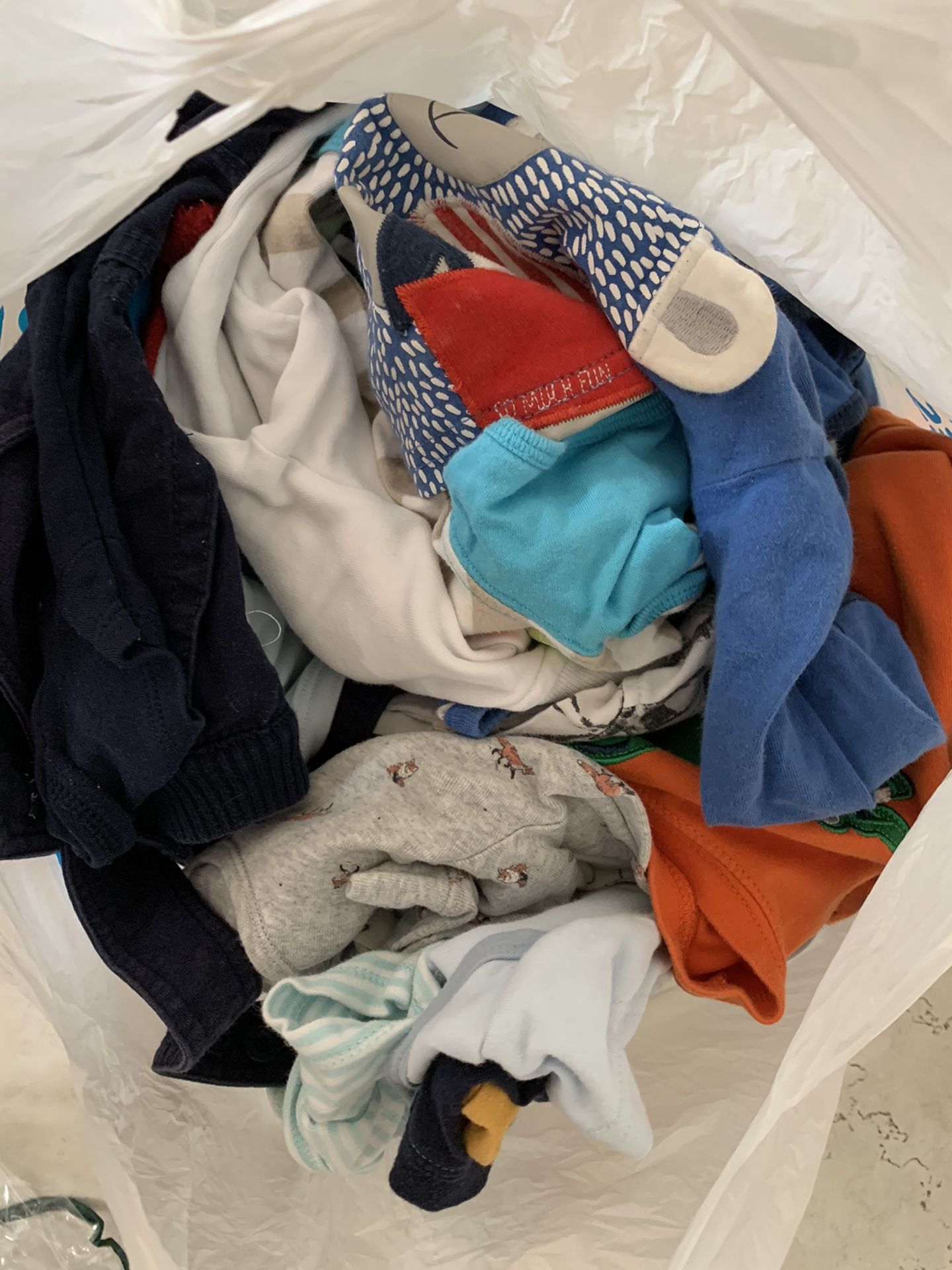 Bag of baby boy clothes