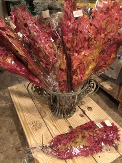 Box full of Faux fall leaves branches