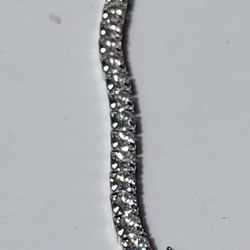  sterling silver tennis bracelet. The bracelet has sparkling White CZ diamonds.  