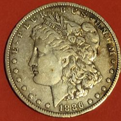 1886 O MORGAN SILVER DOLLAR