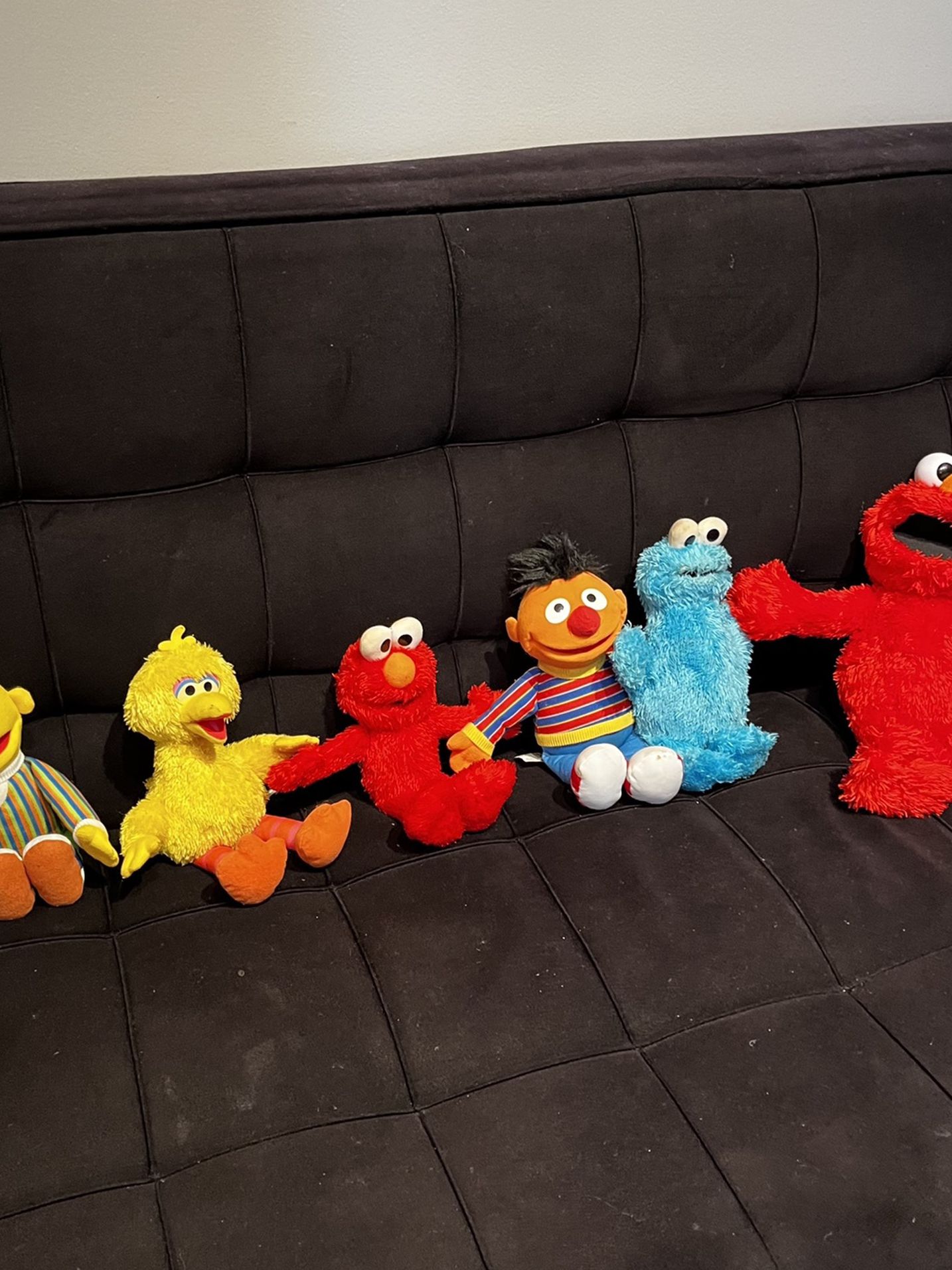 Sesame Street plushies Including “Tickle Me” Elmo