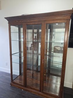 Lighted Oak Curio Cabinet FREE Must pick up