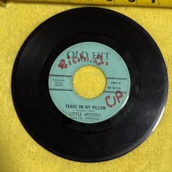 This item is a collectible 7-inch vinyl record, specifically a reissue of "Two People in the World" by Little Anthony and the Imperials on the Old Hit