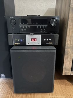 Klipsch speaker set with a Denon Receiver and Monster Power Center