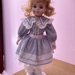 16” Vintage porcelain doll in blue