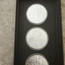 Three 1 Oz Silver Dollars