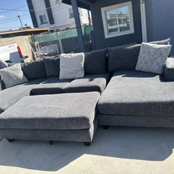 Sectional Gray Color.  Small  Rip In One Of The Cushions 