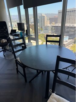 IKEA black marble MARIEDAMM dining table and chairs