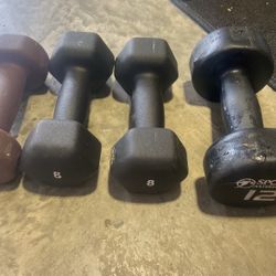 Easy Grip Workout Dumbbells. One of 6 Lbs, A Pair Of 8 Lbs & One Of 12 Lbs