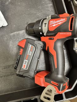 Milwaukee tool with battery and charger