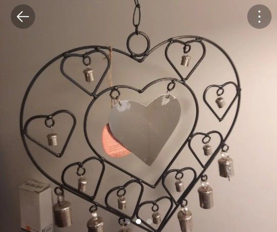 Heart shaped metal wind chime with meta