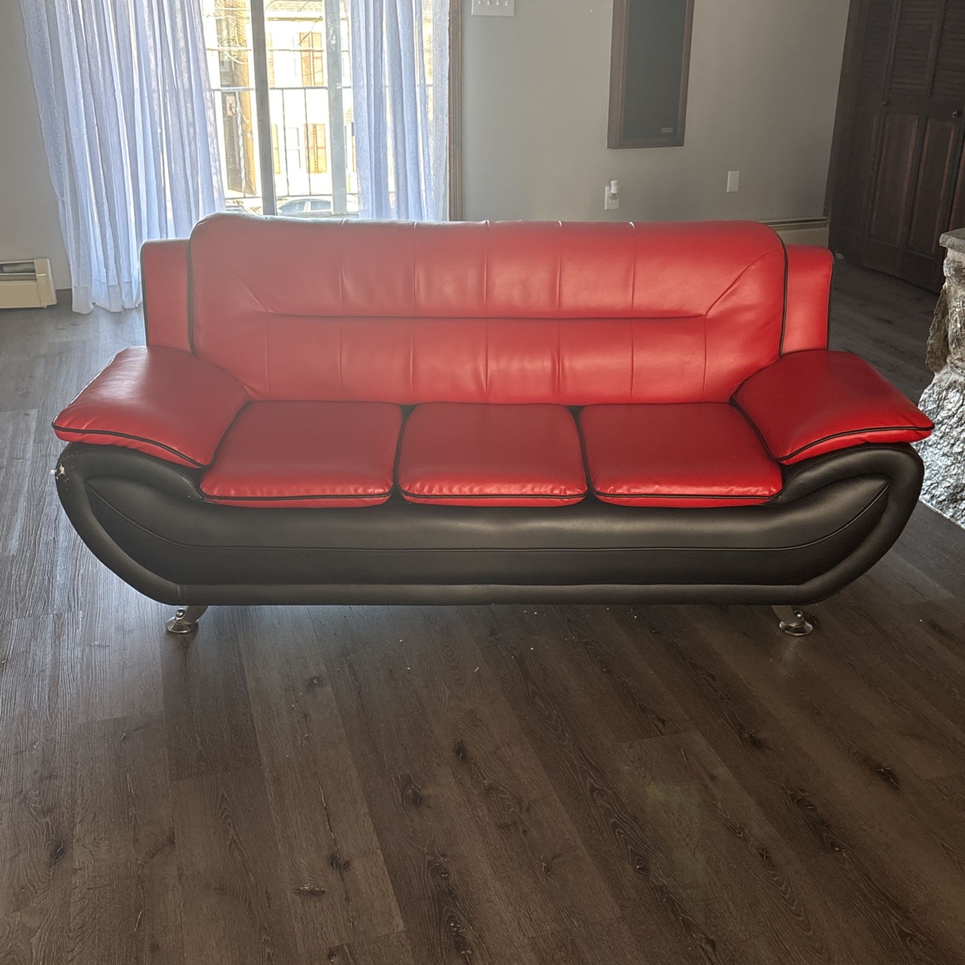 Red couch set , 4 red stools, and a glass table