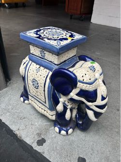 Chinoiserie Ceramic Lucky Elephant Plant Stand In Blue And Cream. Vintage from the 1970s.