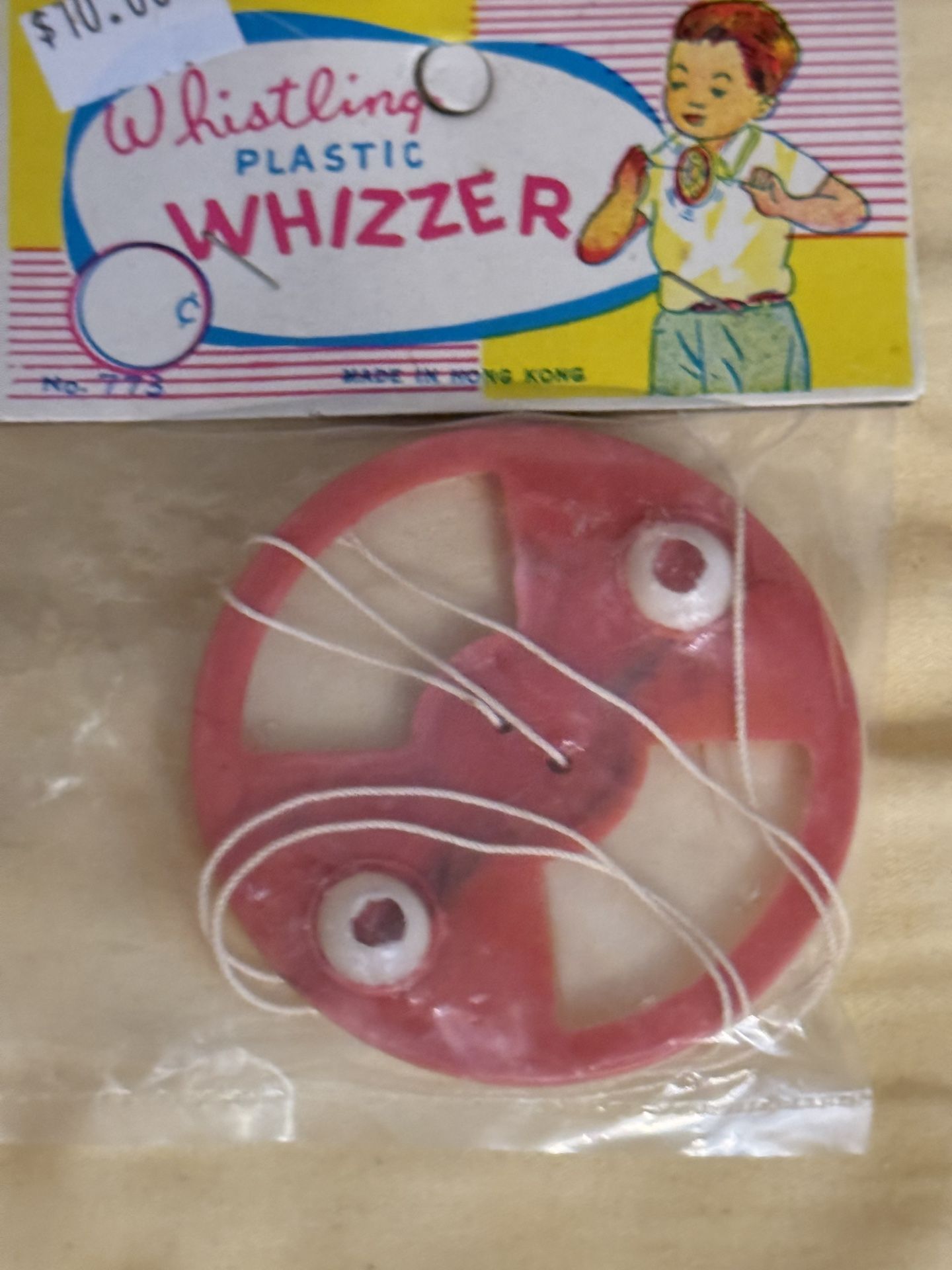 Whistling plastic whizzer