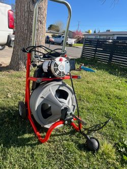RIDGID
K-400 Drain Cleaning Snake
Auger 120-Volt Drum
Machine with C-32IW 3/8 in. x 75 ft. Cable + 4-Piece Tool Set & GI