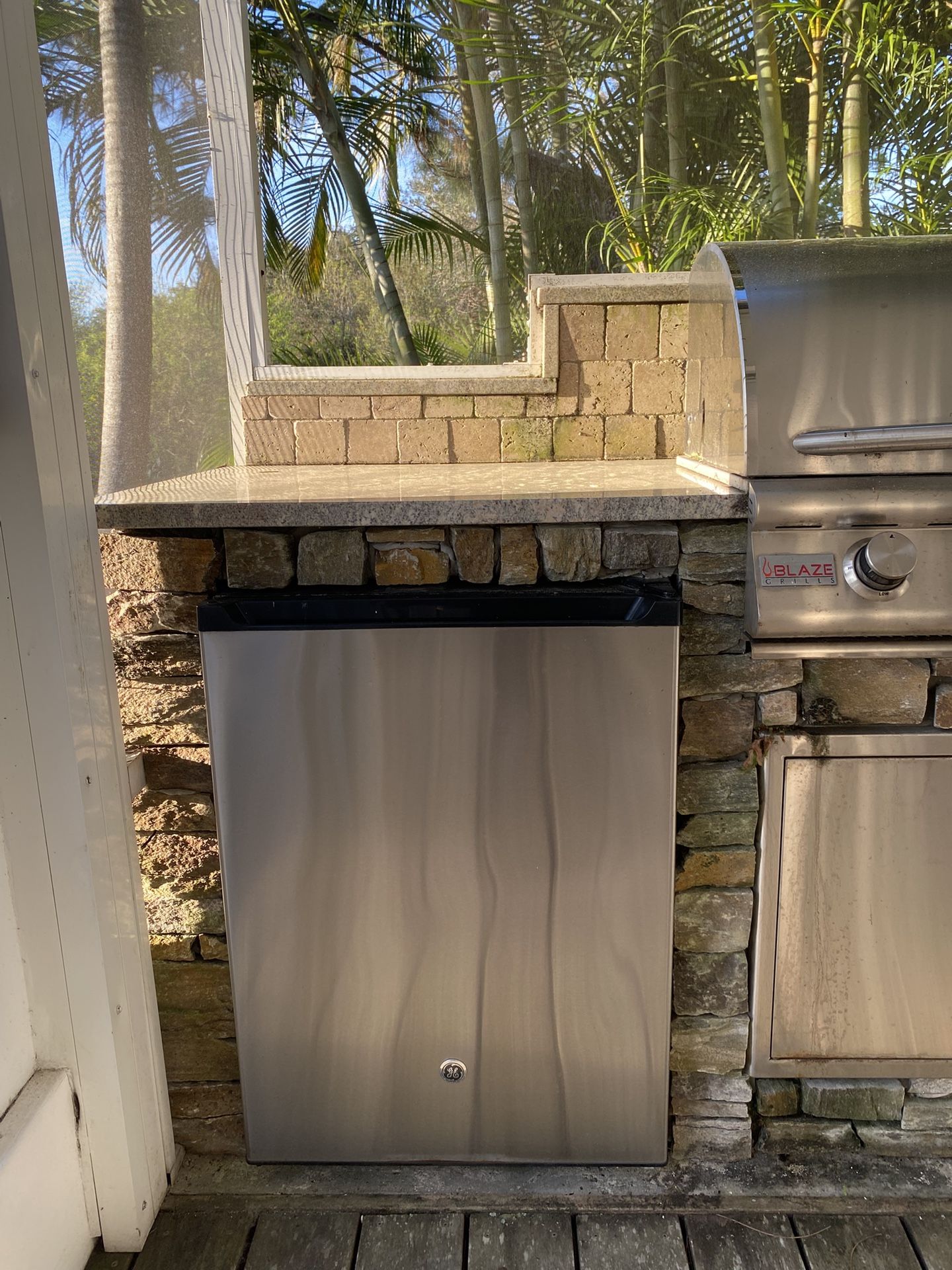 GE Used 5.6 Cu Ft Stainless Steel Fridge