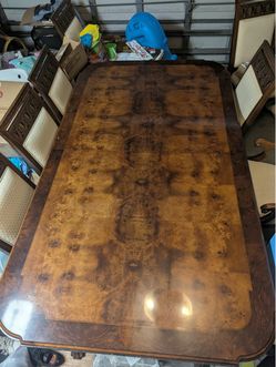 7ft wood dining table  seats 8.