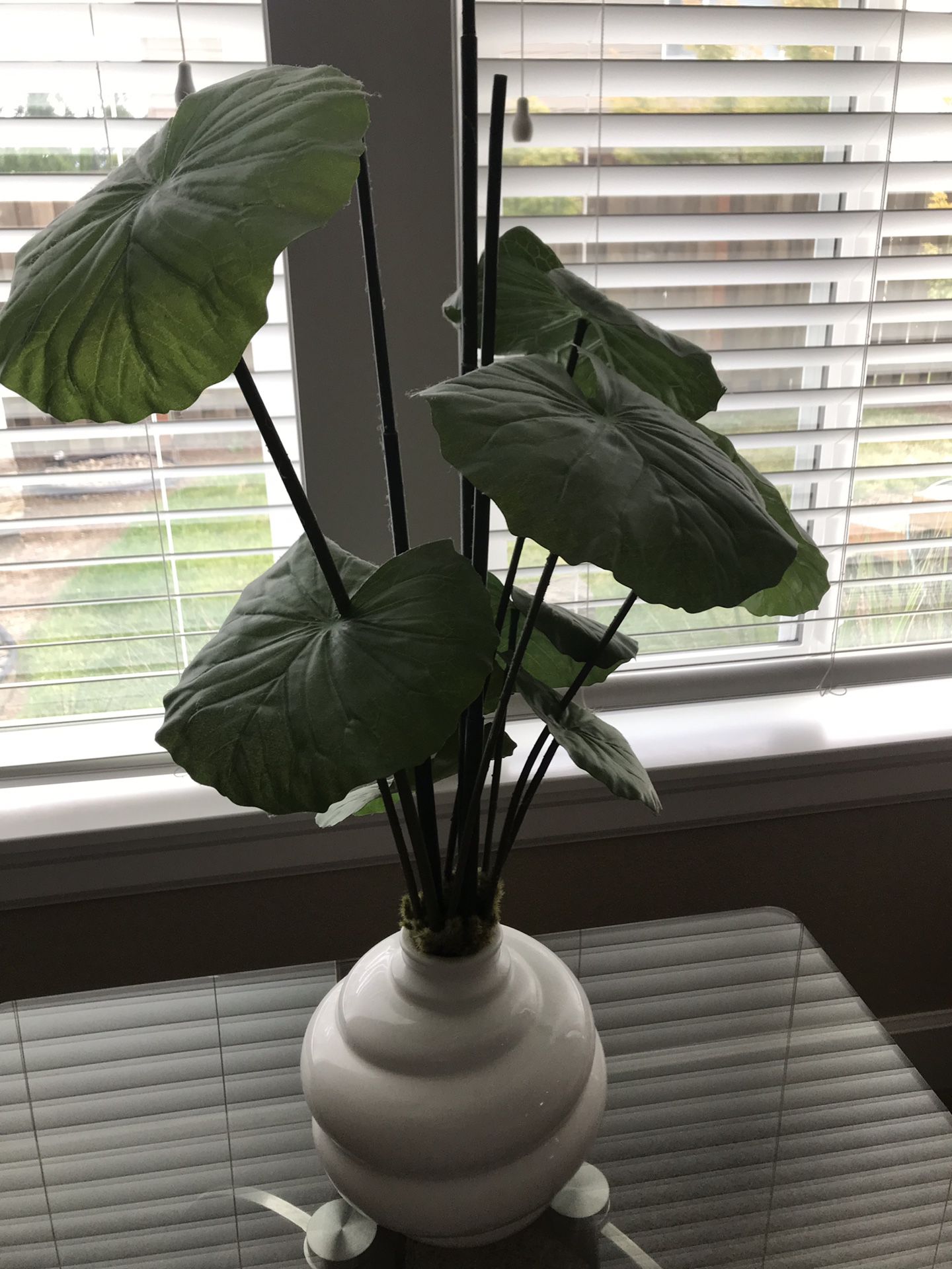 Fake plant in vase