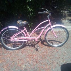 Women's pink Electra 3 speed Beach cruiser