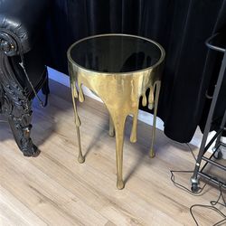 Gold drip side table