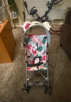 Floral Baby Stroller Colorful floral design with canopy.