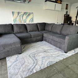 Gray Living Spaces Sectional Couch with chaise (Delivery available)